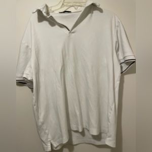 A regular white polo from Zara in a small